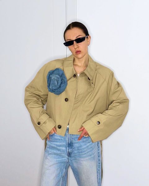Trench coat with a flower