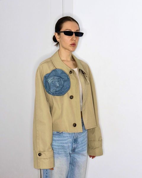 Trench coat with a flower