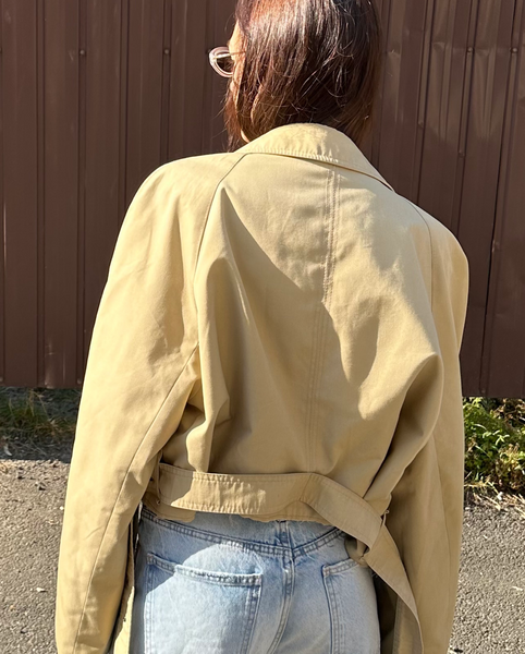 Trench coat with a flower